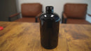 8 oz Black 24-410 Boston Round PET Plastic Bottle